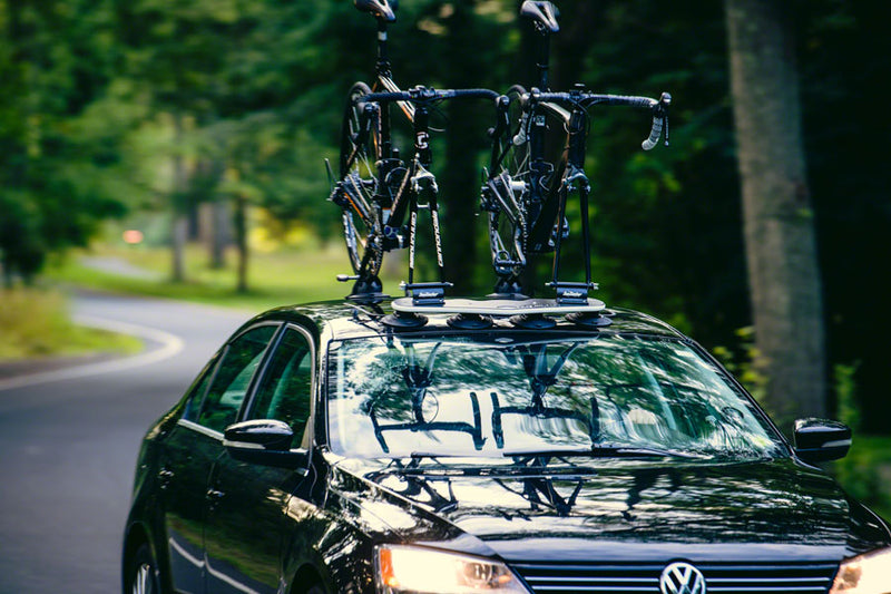 Load image into Gallery viewer, SeaSucker Mini Bomber 2Bike Roof Rack- HUSKE QR Fork Mounts &amp; Rear Wheel Holders
