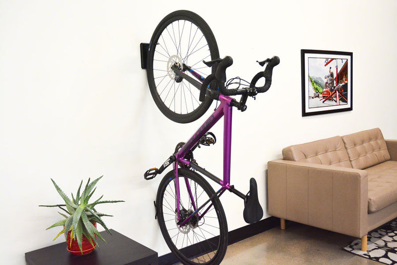 Load image into Gallery viewer, Feedback Sports Velo Hinge V2 Bike Hanger - Wall Mounted, 1-Bike, Up To 3.0&quot; Tire, Black
