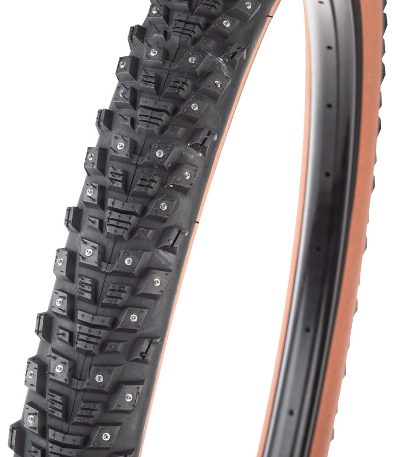 Load image into Gallery viewer, 45NRTH Kahva Tire 29 x 2.25 Tubeless Folding Tan 60tpi 252 Concave Carbide Studs
