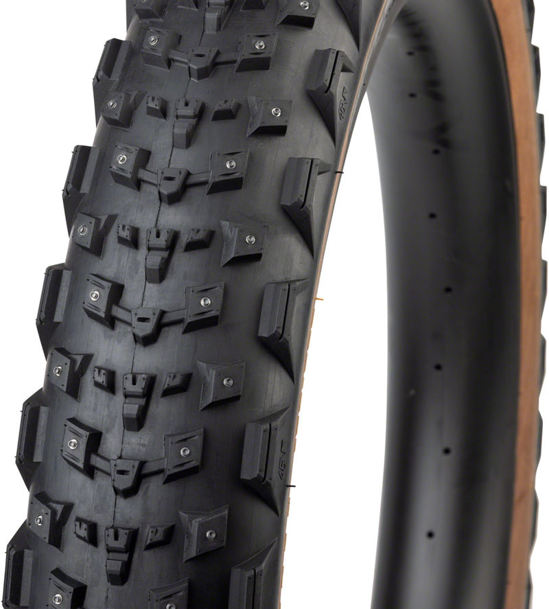 Load image into Gallery viewer, 45NRTH Dillinger 4 Tire - 27.5 x 4.0, Tubeless, Folding, Tan, 60 TPI, 168 Large Concave Carbide Aluminum Studs
