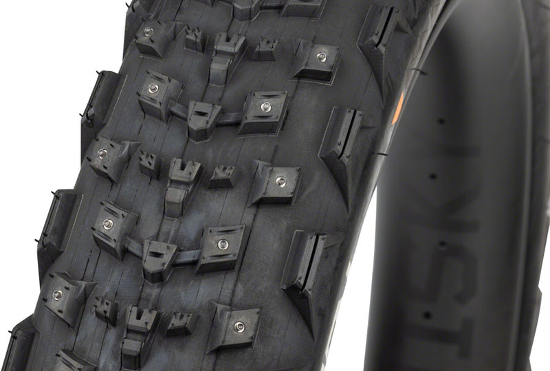 Load image into Gallery viewer, 45NRTH Dillinger 4 Tire - 26 x 4.2, Tubeless, Folding, Black, 120 TPI, 168 Large Concave Carbide Aluminum Studs
