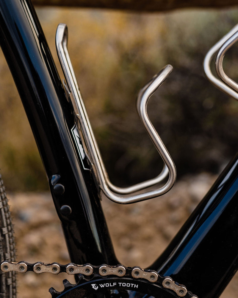 Load image into Gallery viewer, Wolf Tooth Morse Bottle Cage Titanium Silver | Standard Bolt-On
